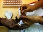 File photo of a government health worker collecting blood sample from a patient at a health centre.