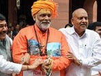 The Opposition MPs, including Pappu Yadav, in an unusual display of protest used street theatre to protest against the alleged embezzlement of donations. (ANI)