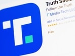 Truth API gives Wall Street firms faster access to Truth Social posts, raising questions over trading advantages (AP Photo/John Minchillo)