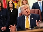 US President Donald Trump speaks during an executive order signing ceremony in the Oval Office of the White House in Washington, DC, on Monday. (Bloomberg)