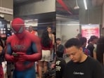 A viral video shows dozens of moviegoers standing outside the auditorium.