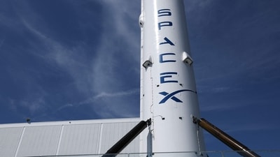 A SpaceX Falcon 9 rocket is displayed outside a Space Exploration Technologies Corp. facility in Hawthorne, California on March 26, 2026. (AFP)