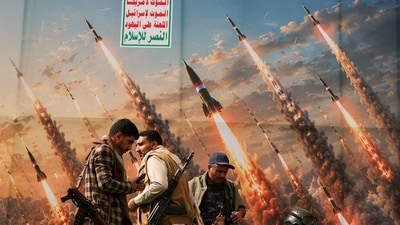 Houthi activists stand on a platform against a banner depicting Houthi missiles, at an anti-Saudi rally amid an escalation with the kingdom, in Sanaa, Yemen, (REUTERS)