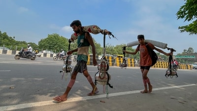 Kanwariyas seen carrying holy water from the Ganga River Haridwar. (Parveen Kumar/Hindustan Times) Kanwariyas seen carrying holy water from the Ganga River Haridwar. (Parveen Kumar/Hindustan Times)