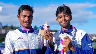 India's Dilip Mahadu Gavit, left, gold medallist, and Mohammed Basil, silver medallist, pose with their medals after the Men's 100m T47 para-athletics event (PTI) India's Dilip Mahadu Gavit, left, gold medallist, and Mohammed Basil, silver medallist, pose with their medals after the Men's 100m T47 para-athletics event (PTI)