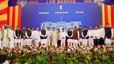 Karnataka Chief Minister DK Shivakumar and Governor Thawar Chand Gehlot pose with newly inducted ministers and other leaders. (@DKShivakumar/X via PTI Photo)(PTI08_03_2026_000499B) (@DKShivakumar) Karnataka Chief Minister DK Shivakumar and Governor Thawar Chand Gehlot pose with newly inducted ministers and other leaders. (@DKShivakumar/X via PTI Photo)(PTI08_03_2026_000499B) (@DKShivakumar)