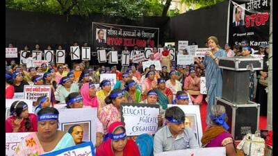 The protest was attended by sanitation workers, their families and activists who demanded strict implementation of the Prohibition of Employment as Manual Scavengers and their Rehabilitation Act, 2013. (HT) The protest was attended by sanitation workers, their families and activists who demanded strict implementation of the Prohibition of Employment as Manual Scavengers and their Rehabilitation Act, 2013. (HT)