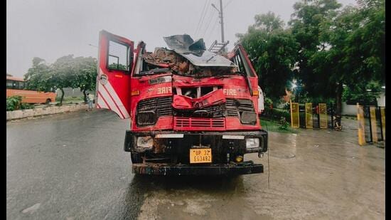 A wall and beam collapsed onto a fire engine.