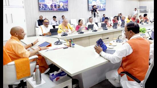 Chief minister Yogi Adityanath chairs a Cabinet meeting at his official residence, in Lucknow on Tuesday. (Sourced)