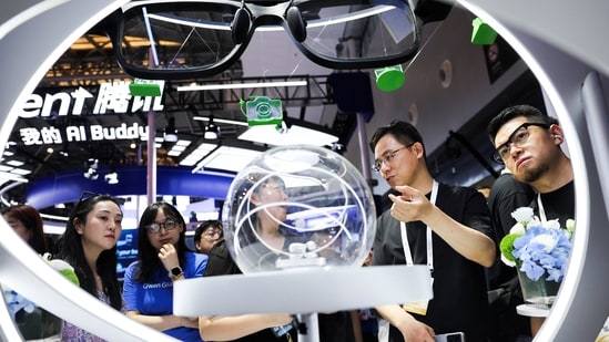 People visit the Alibaba booth during the World Artificial Intelligence Conference (WAIC) in Shanghai, China, July 17, 2026.