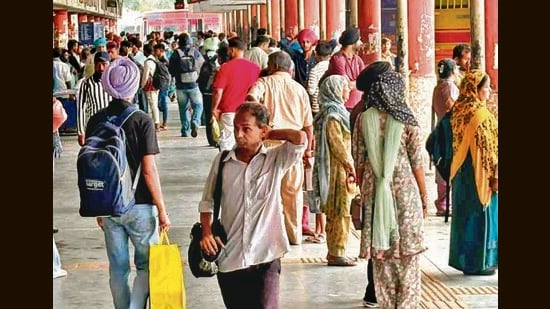 Commuters at the ISBT in Ludhiana on Tuesday. (HT Photo)