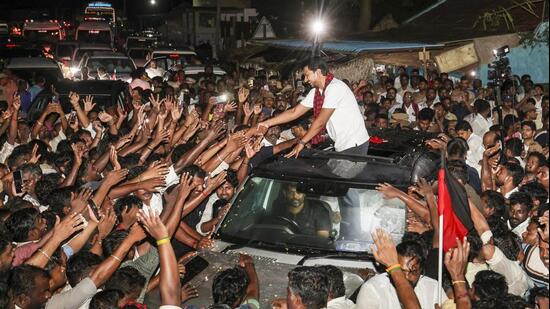 Tamil Nadu Leader of the Opposition Udhayanidhi Stalin being greeted by supporters after being questioned at the Sengipatti police station, in Thanjavur district, Tamil Nadu, Tuesday. (PTI)