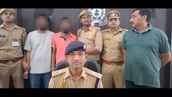 Two alleged gang member of the smugglers who were caught after the courier was looted (HT Photo)