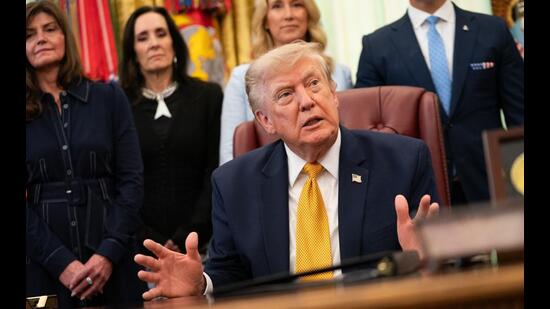 US President Donald Trump speaks during an executive order signing ceremony in the Oval Office of the White House in Washington, DC, on Monday. (Bloomberg)