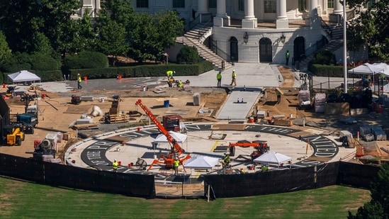 Construction continues on the White House helipad on the South Lawn, July 30, 2026, in Washington.