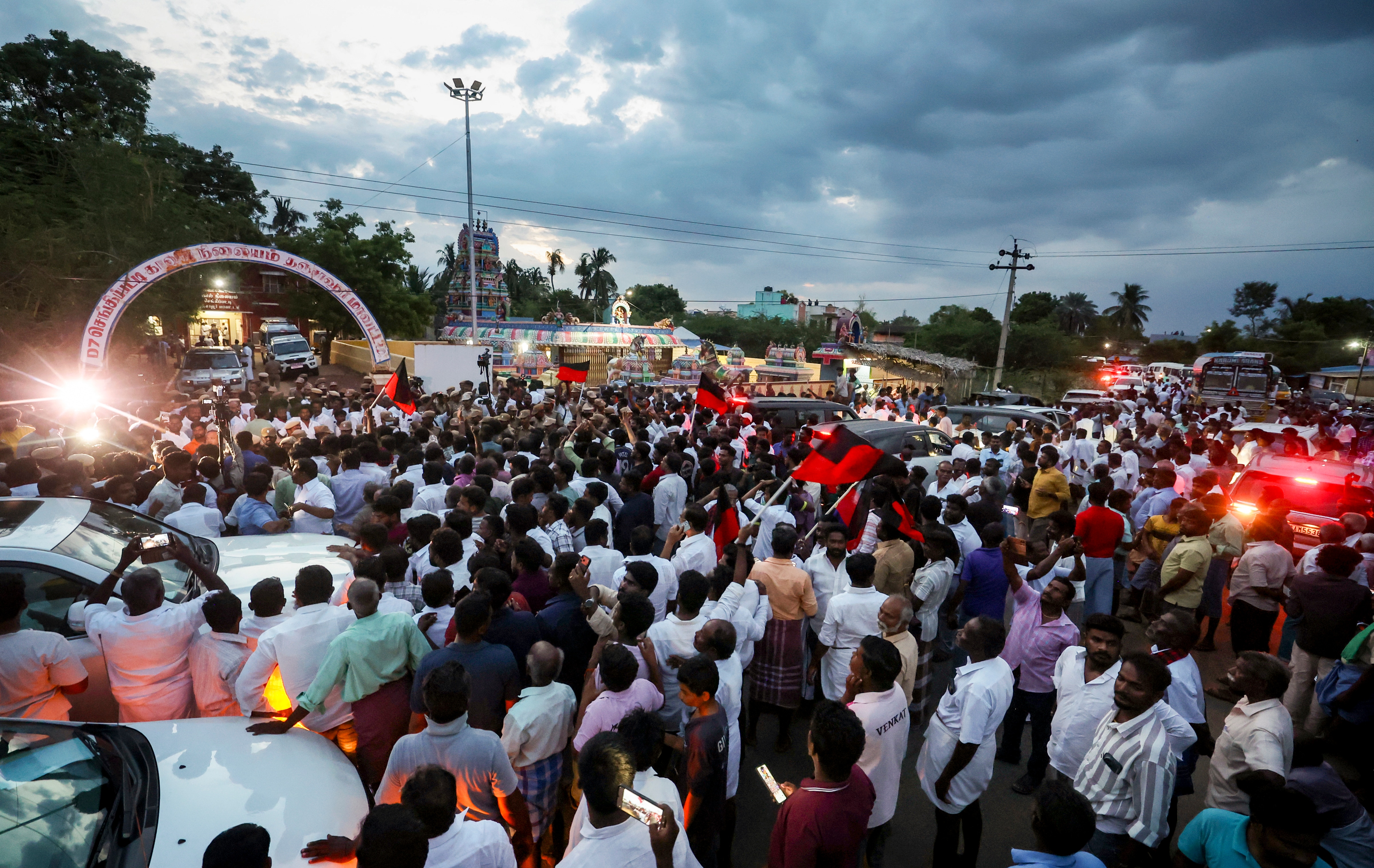 DMK workers gather outside the Chengipatti Police Station, where former Tamil Nadu deputy chief minister Udhayanidhi Stalin is being questioned by police, in Thanjavur district, (PTI) DMK workers gather outside the Chengipatti Police Station, where former Tamil Nadu deputy chief minister Udhayanidhi Stalin is being questioned by police, in Thanjavur district, (PTI)