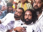 Environmentalist Sonam Wangchuk interacts with student leader Devendra Nath Mahato, who continues his hunger strike to protest against alleged irregularities in the JPSC, JJSC and various other competitive exams at Jaipal Singh Munda Stadium, in Ranchi on Wednesday.