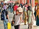 Commuters at the ISBT in Ludhiana on Tuesday. (HT Photo)