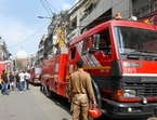 Delhi Fire Service personnel at Chawri Bazar near Jama Masjid, in New Delhi, on Tuesday, June 2 after a fire broke out at a shop and a godown