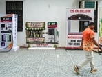 Cutouts of petrol dispensing machines at AAP office ahead of protest against E20 fuel planned by the party this week.