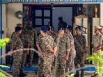 Security personnel stand outside the 34 Battalion camp after a CRPF officer shot his two colleagues dead and injured another before killing himself, at Katimari in Nagaon district, Assam, Tuesday, Aug. 4, 2026.(PTI)