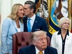 President Donald Trump appointed Jennifer Rauchet to chair the Presidential Military Spouse Commission, sparking criticism over her past involvement in Pentagon communications.