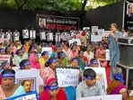 The protest was attended by sanitation workers, their families and activists who demanded strict implementation of the Prohibition of Employment as Manual Scavengers and their Rehabilitation Act, 2013. (HT)