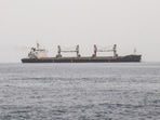 A commercial vessel passes through an international shipping lane off Yemen's Hanish Island in the Red Sea.
