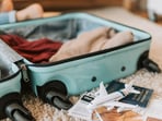One cabin suitcase, one sling bag and eight days in Hong Kong proved packing light can make every trip far less stressful.(Canva.com)
