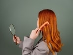 Read more to find out dietary changes to reduce hair fall.(Pexel)