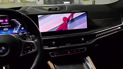 BMW owners are unhappy with the Spider-Man ad playing inside their cars. (X/trending_tony) BMW owners are unhappy with the Spider-Man ad playing inside their cars. (X/trending_tony)