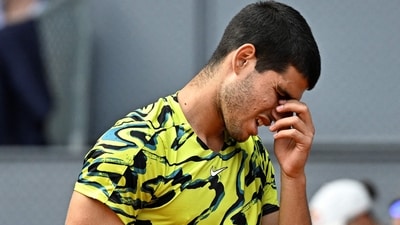 Carlos Alcaraz reacts during his 2023 ATP Tour Madrid Open tennis tournament. Carlos Alcaraz reacts during his 2023 ATP Tour Madrid Open tennis tournament.