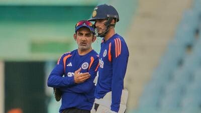 India's captain Shubman Gill, right, talks with head coach Gautam Gambhir . (AP Photo)