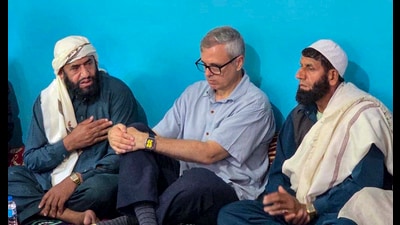 Jammu and Kashmir chief minister Omar Abdullah meets and offers condolences to a family who lost eight family members in cloudburst-triggered flash floods and landslides, at Murrah village in Surankote sector of Poonch district, on Wednesday. (PTI) Jammu and Kashmir chief minister Omar Abdullah meets and offers condolences to a family who lost eight family members in cloudburst-triggered flash floods and landslides, at Murrah village in Surankote sector of Poonch district, on Wednesday. (PTI)
