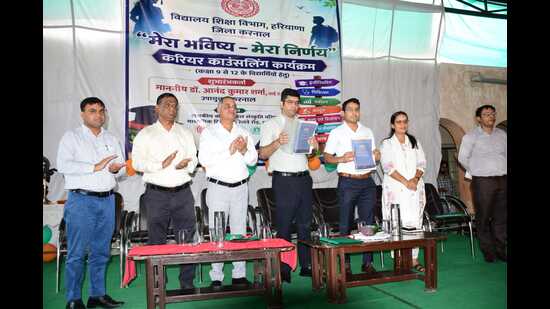 Karnal deputy commissioner Anand Kumar Sharma on Wednesday launched “My Future - My Decision” career counselling program for the education department at the Government Girls Model Sanskriti Senior Secondary School. (HT Photo)