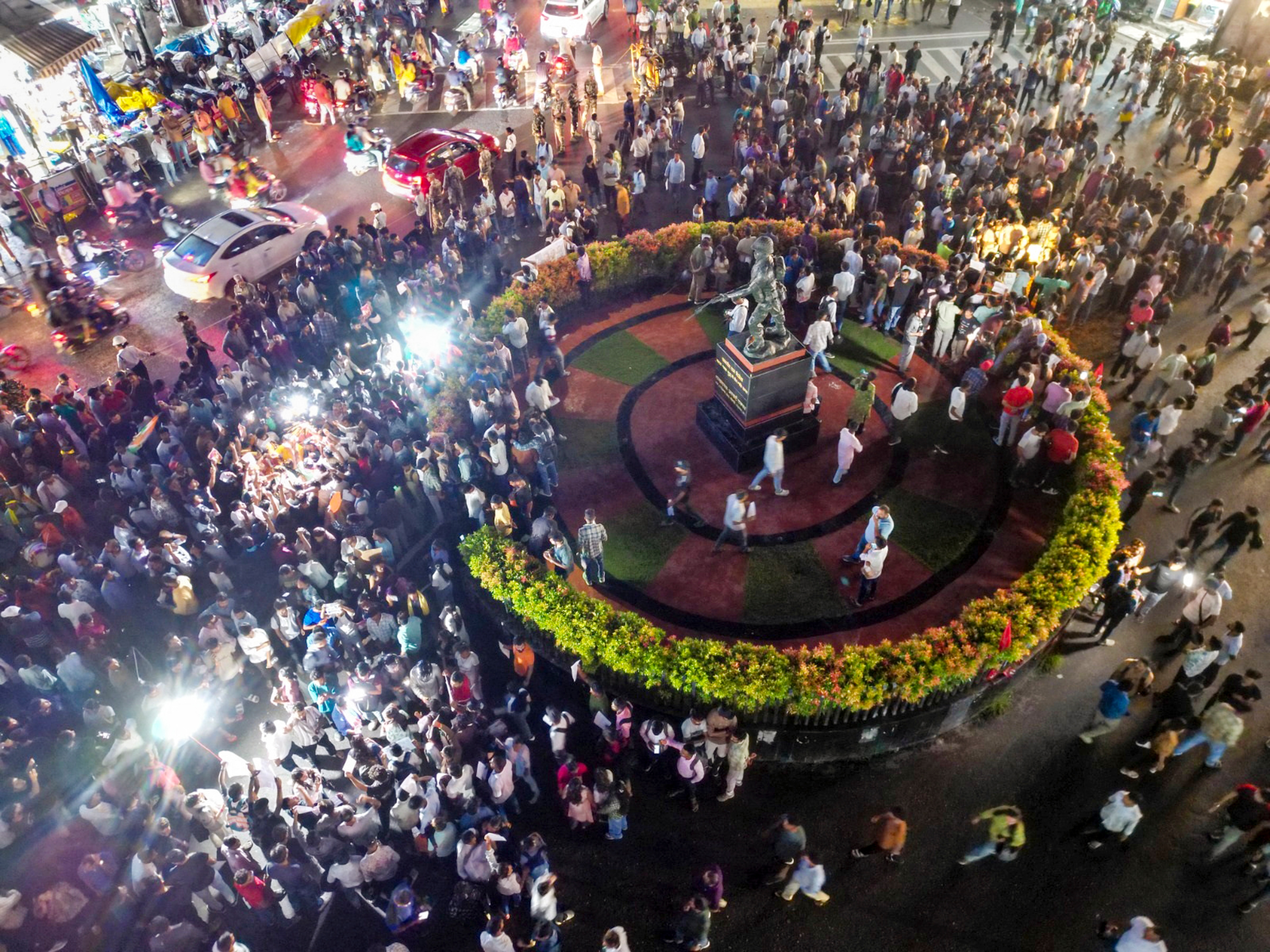 Job aspirants and students gather during a march to protest against the state government. (PTI) Job aspirants and students gather during a march to protest against the state government. (PTI)