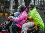 Gram it: Rains can't stop Delhiites from stepping out to reach their destination. Here's how a family of three rides on a two-wheeler while covered with raincoats. The weather department has issued a forecast of heavy to moderate rain for today as well, from early morning to noon.