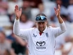 Joe Root reacts.
