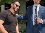 Abdul El-Sayed, candidate in the Democratic primary for US Senate in Michigan, talks poolside with streamer Hasan Piker at a party for content creators supporting his campaign, Monday, Aug. 3, 2026, in Detroit.