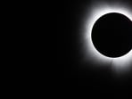 (FILES) BRADY, TEXAS - APRIL 08: The moon fully passes over the sun's horizon during a Total solar eclipse on April 08, 2024 in Brady, Texas. Millions of people have flocked to areas across North America that are in the 