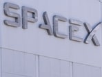 SpaceX stock faces a key year ahead as revenue, Starlink and AI growth rise. (Photo by Patrick T. Fallon / AFP)