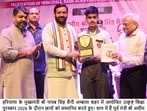 Haryana chief minister Nayab Singh Saini felicitating a student in Ambala in Wednesday. (HT Photo)