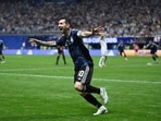 Lionel Messi of Argentina celebrates the team's second goal against England.