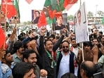 Pakistan Tehreek-e-Insaf (PTI) party supporters hold portraits of their jailed leader and the country's former Prime Minister Imran Khan during a protest demanding his release, in Quetta on August 5, 2026.