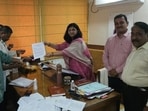 Transfer of vehicle RCs to new owners has been stalled for the past 15 days across Maharashtra following integration of the RC transfer process with Aadhaar-based name verification. Members of the state transporters’ association submitted a memorandum to Pune regional transport officer Archana Gaikwad. (HT)