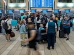 Travellers wait at the check-in at Vancouver International Airport in Richmond, British Columbia (Photograph for representative purpose only) (AP)