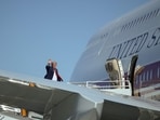US President Donald Trump waves before boarding Air Force One at Harry Reid International Airport on August 05, 2026 in Las Vegas, Nevada.(Getty Images via AFP)