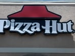 Pizza Hut is closing US restaurants as sales fall and customers shift to faster, cheaper food. (Joe Raedle/Getty Images/AFP (Photo by JOE RAEDLE / GETTY IMAGES NORTH AMERICA / Getty Images via AFP)