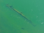A drone view shows a sunken German warship from World War II, exposed due to low Danube River levels caused by drought and extreme heat.