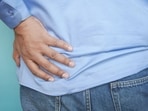 Persistent pain in the back and the sides can be a warning sign of kidney stone. 